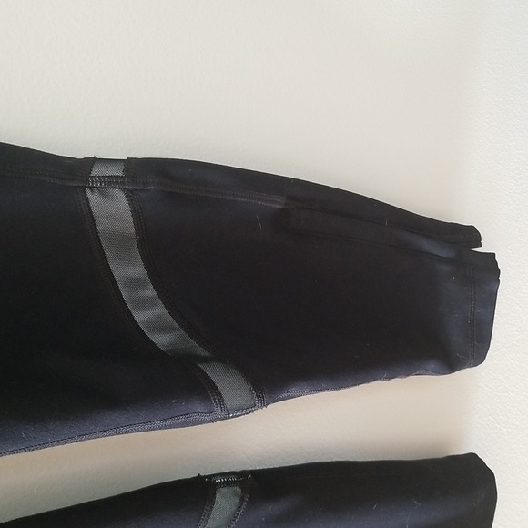 Fila Women's sport leggings with reflector strips zippers at bottom - Picture 3 of 7